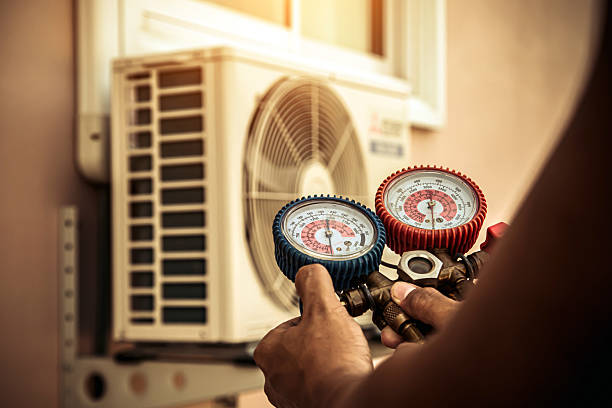 Professional Heat Pump Repair technician working in Taft, TX